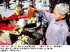 Child sells drink to earn his livelihood for support his  family, at his push-cart at Masjid