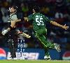 Umar Gul exults after picking up Brendon McCullum