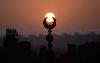 The sun rises over a mosque in Cairo on the first day of Eid al-Adha,