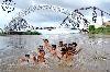 SUKKUR: Children enjoying bathing near Lance Rohri Bridge.